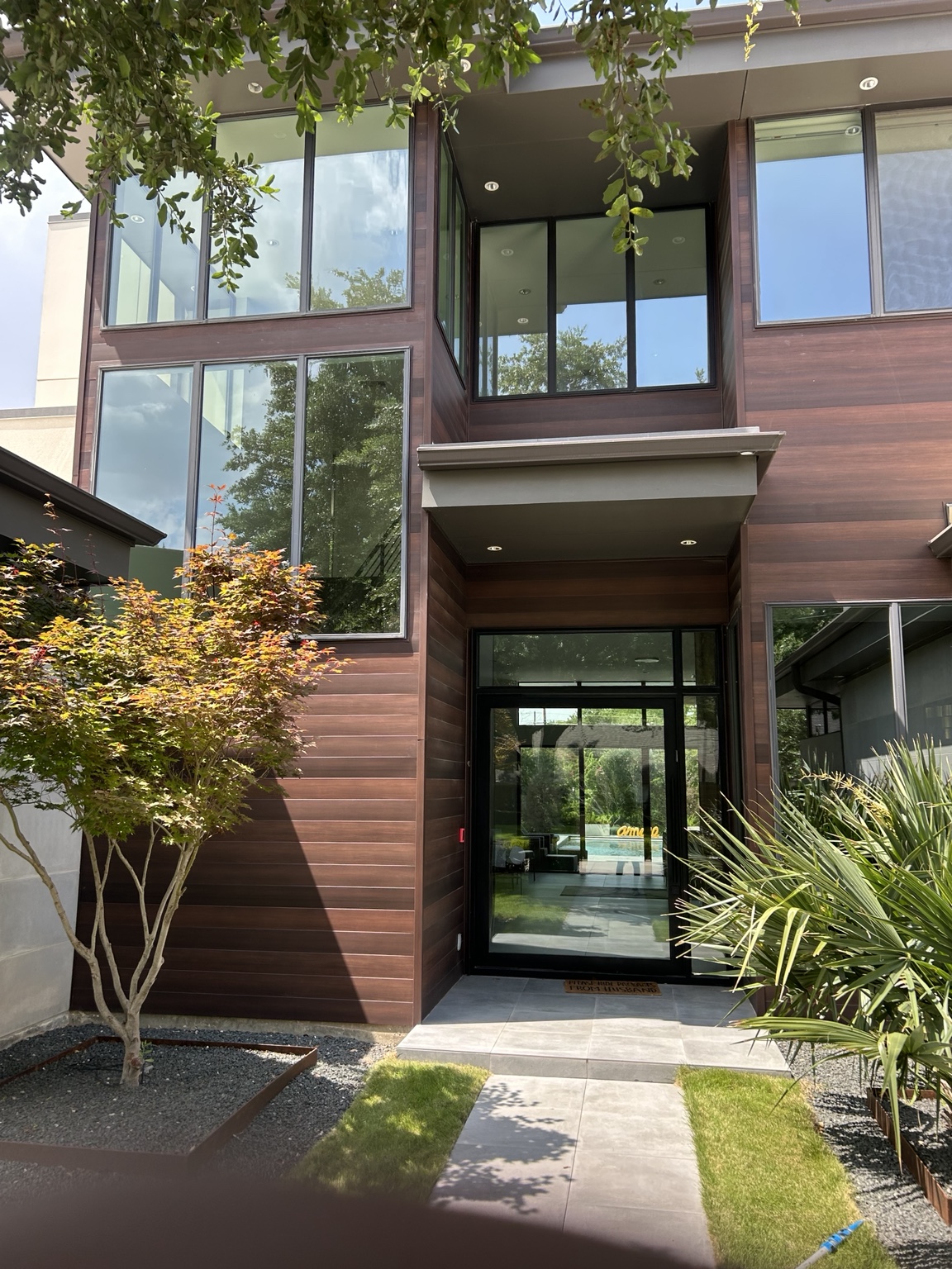 Clean windows on a modern home